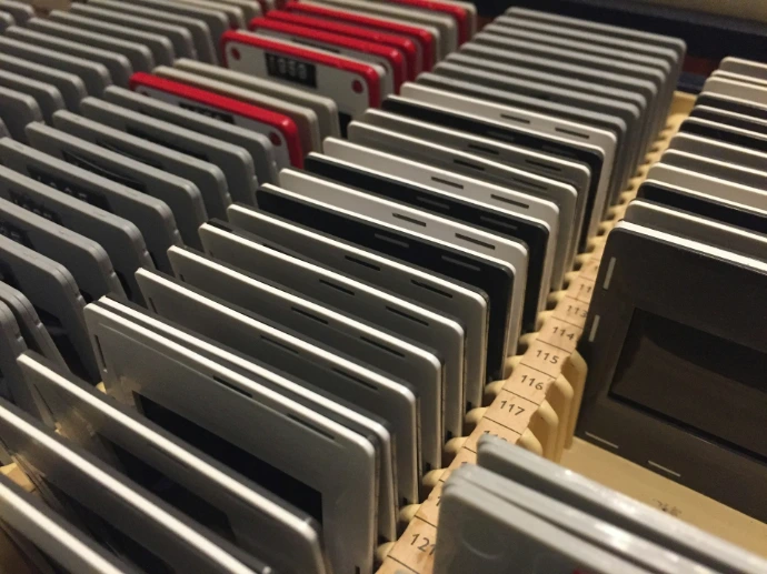 rows of computer monitors sitting next to each other